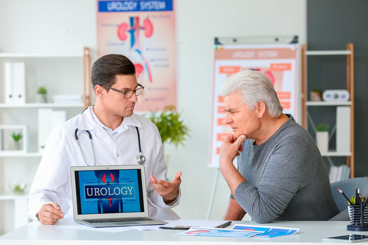 urologist explaining hot to prevent a urinary tract infection to a senior